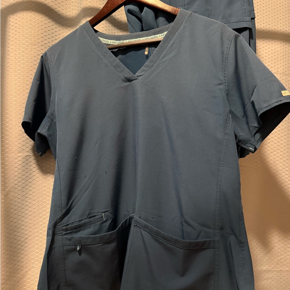 23. Per loved Med Couture Women's Navy V-Neck Scrub set